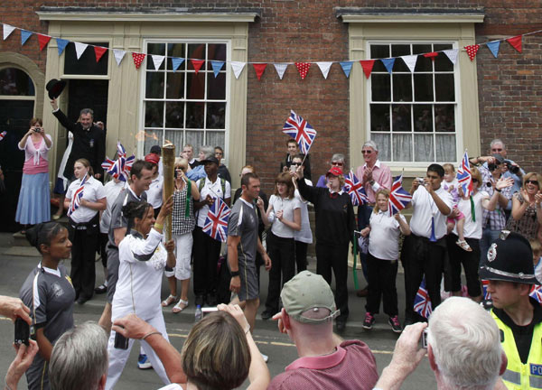 Olympic torch relay continues across Wales