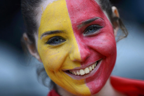 Painted faces of Olympic fans