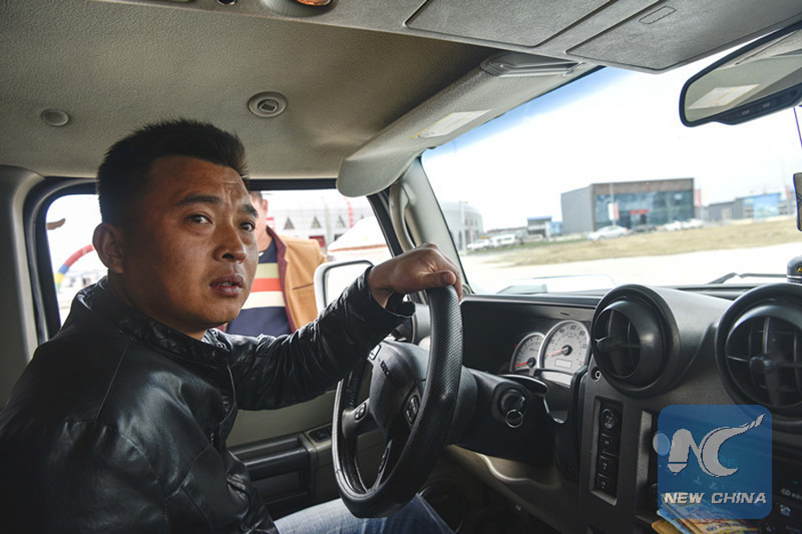 China-Kazakhstan border trade drives Hummer driver's dream for fortune