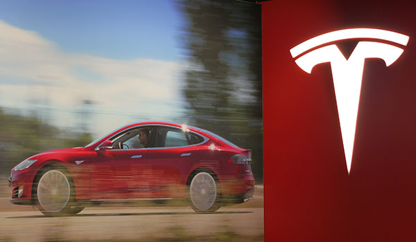 Tesla to raise $1.6b to build battery factory