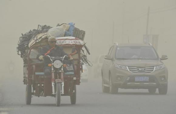 China to take 5 million old cars off road in 2014