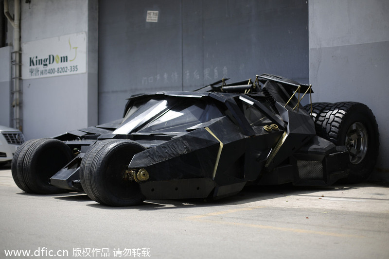 Batman fan opens door to his Batmobile