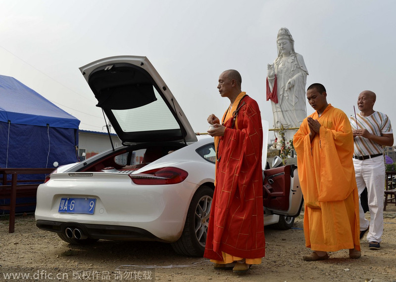 Monks hold consecration event for Porsche sports car