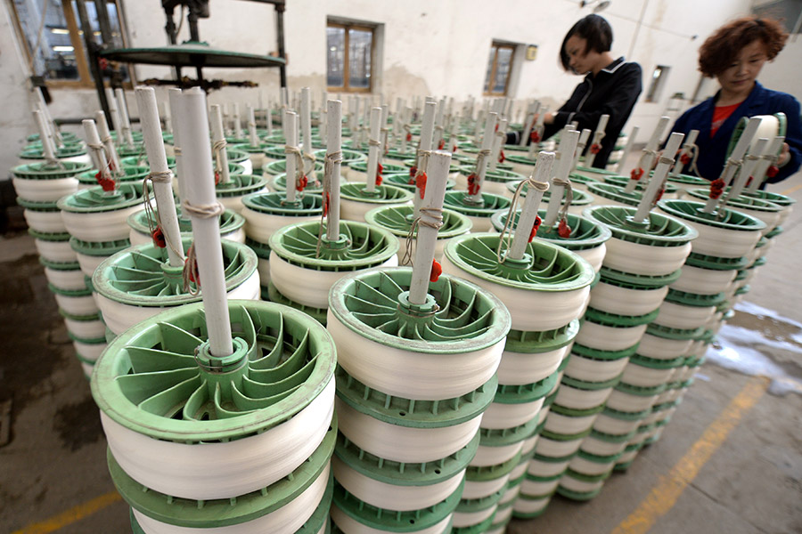 Technology improves Huzhou's silk industry