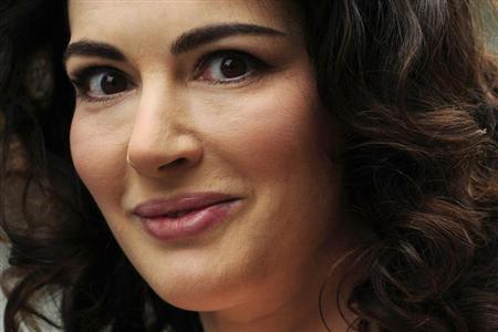 Nigella Lawson's husband downplays photos of him grabbing her neck