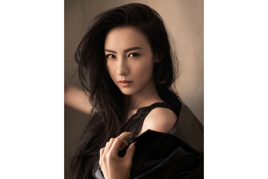 Actress Cecilia Cheung poses for fashion magazine