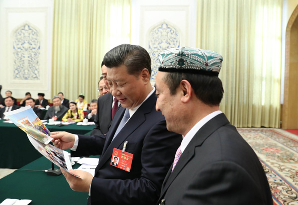 Xi calls for building 'great wall of iron' for Xinjiang's stability