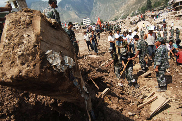 Aid, supplies pour into mudslide-flattened Zhouqu