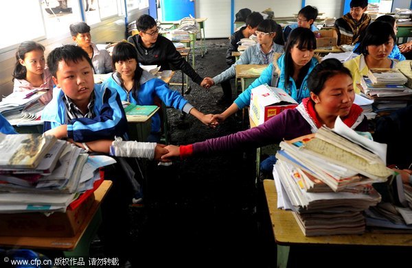 Students resume studies after quake