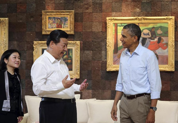 Obama and Xi start talk with a walk