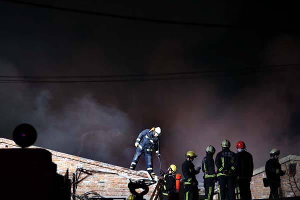 Beijing fire kills 12