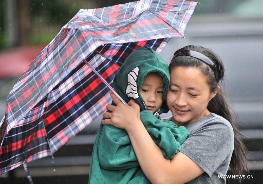 Beijing issues blue warning signal of rainstorm