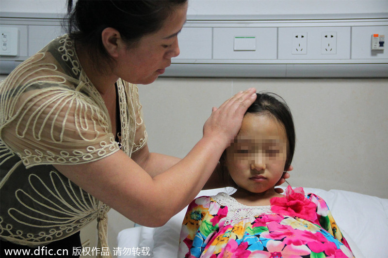 Guangzhou hospital offers hope to tumor girl