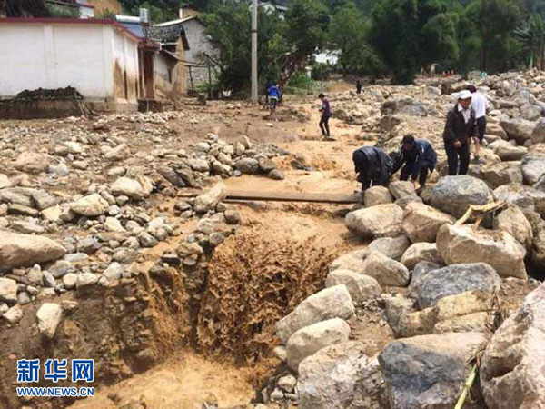 Mountain flash flood in SW China kills five