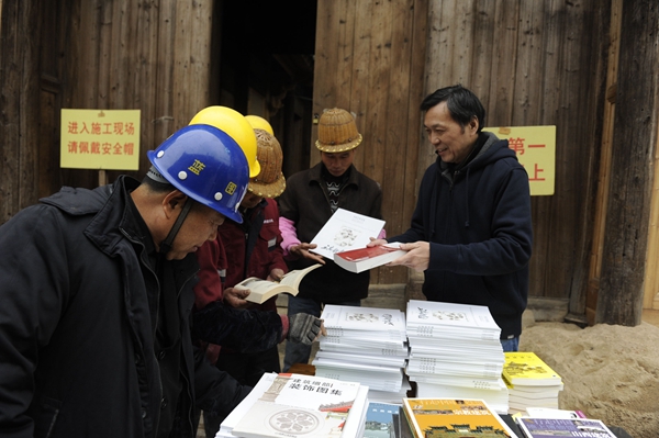 Professor joins hands in ancient architecture maintenance