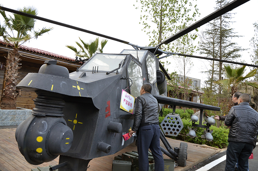 Airplane- enthusiast farmer builds 'military helicopter'