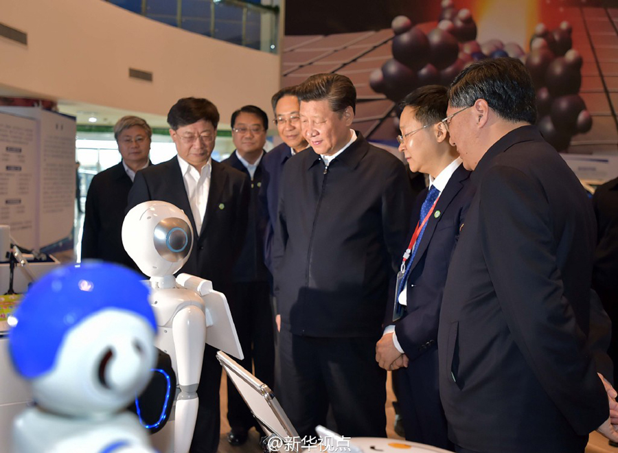 Human-like robots say 'hi' to President Xi