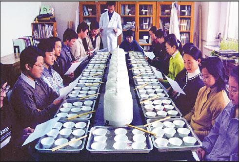 Rice tasters evaluate varieties grain by grain