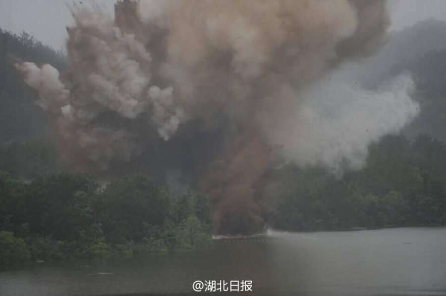 Dam's floodway blasted to discharge water in Hubei province