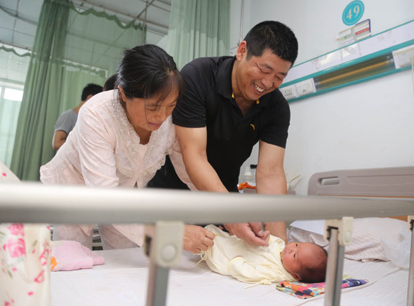 Baby brings new joy to bereaved elderly couple