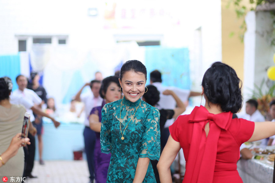 Dancing, food and religion, all in a Xinjiang wedding