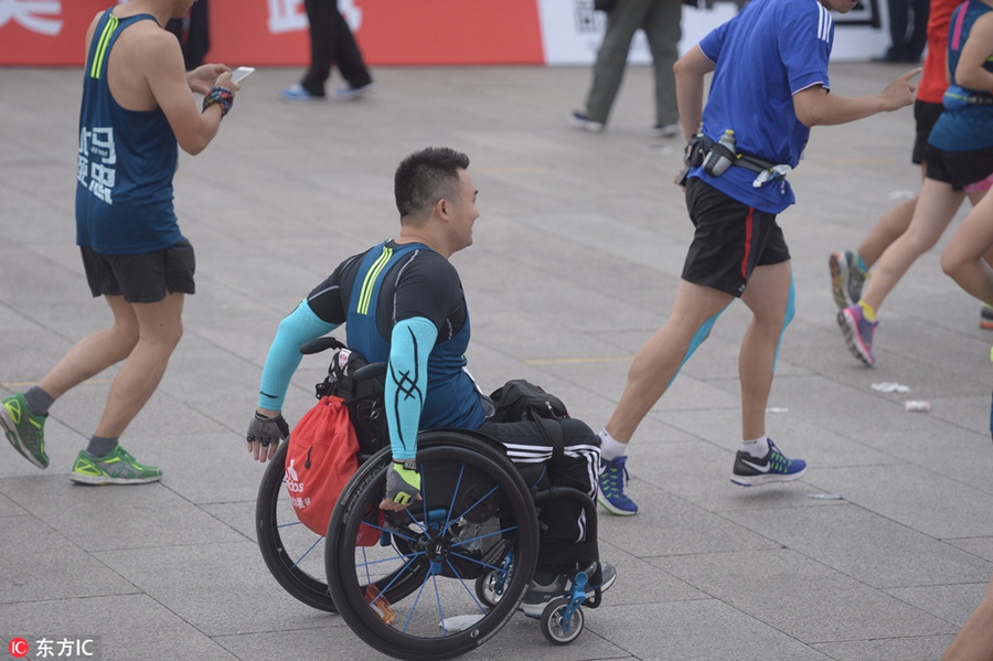 Runners compete during Beijing marathon