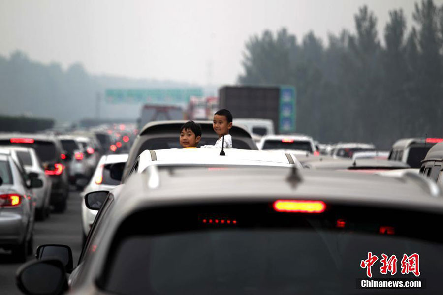 Millions move across China on National Day