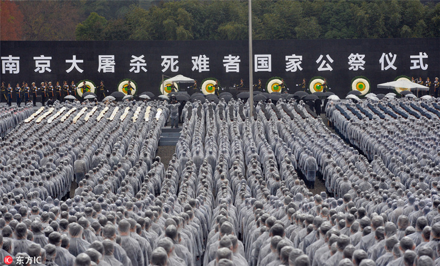 Thousands pay tribute to victims of Nanjing Massacre