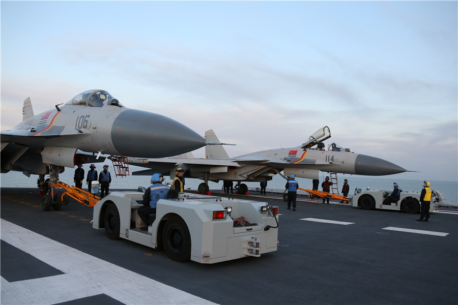 China's navy carries out live-fire exercises from CNS Liaoning carrier