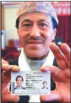 Foreigners in Tibet 'really happy' to be given green cards