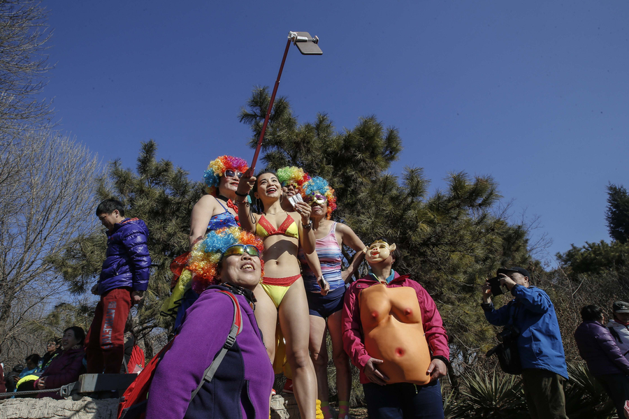 Reporter steals the show at Beijing Naked Run