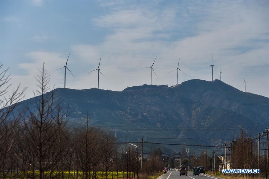 11 wind turbines of power plant officially join power grid in E China