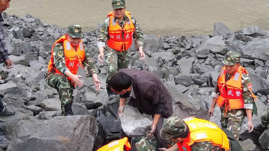 Xi urges all-out rescue effort after landslide buries 62 homes