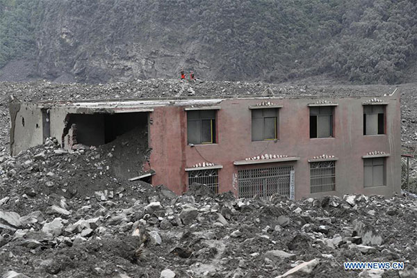 15 found dead in SW China landslide burying 120