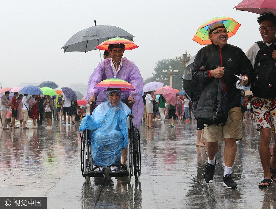 Love for Beijing despite rainstorm