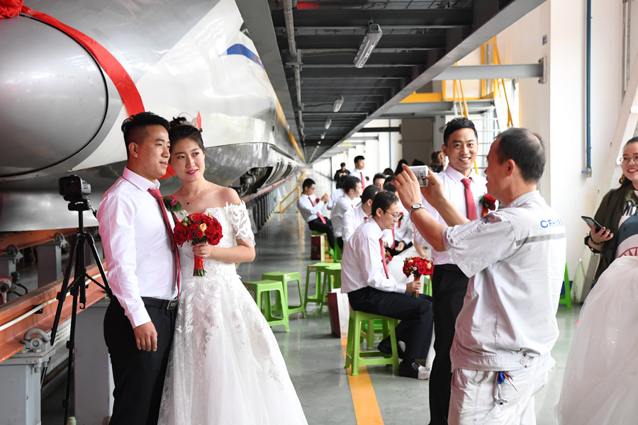 Couples start new journey at bullet train maintenance center