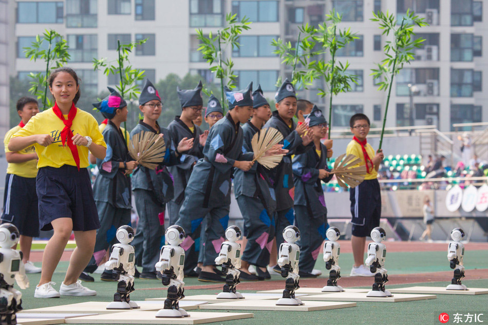 Students-made robots perform at sports meeting in Hangzhou