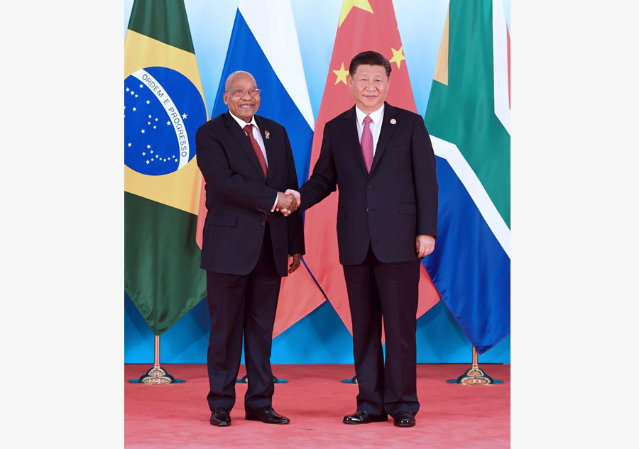 Leaders of BRICS countries pose for group photo before summit