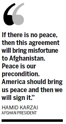 Karzai does about-face on US troops deal