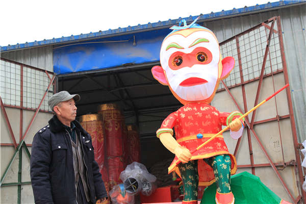 Artisan hand crafts lanterns