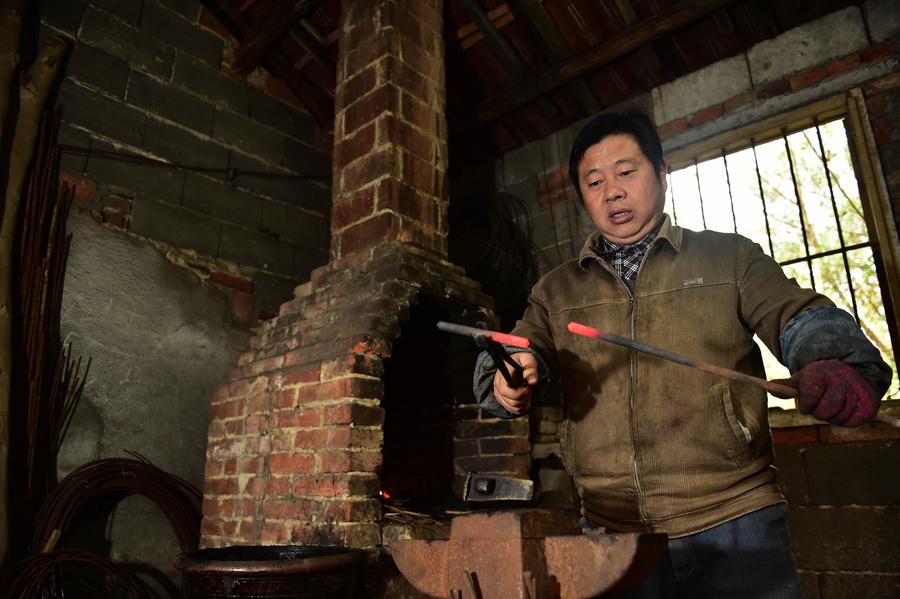 Craftsman makes scissors in traditional way