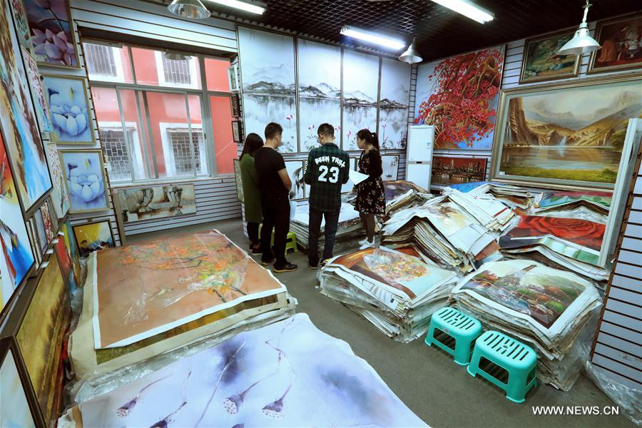 S China's village famous for oil painting facsimile industry