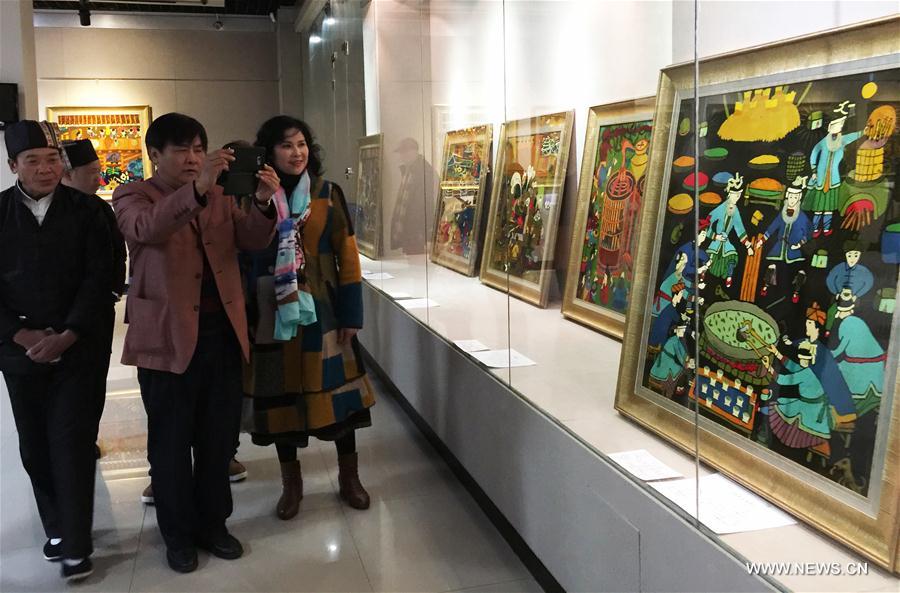 Exhibition on farmer paintings of Dong ethnic group held in S China