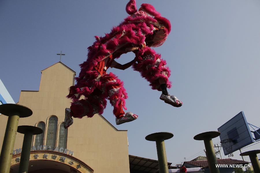 Lion dancers perform at Indonesian Chinese school for Chinese Lunar New year