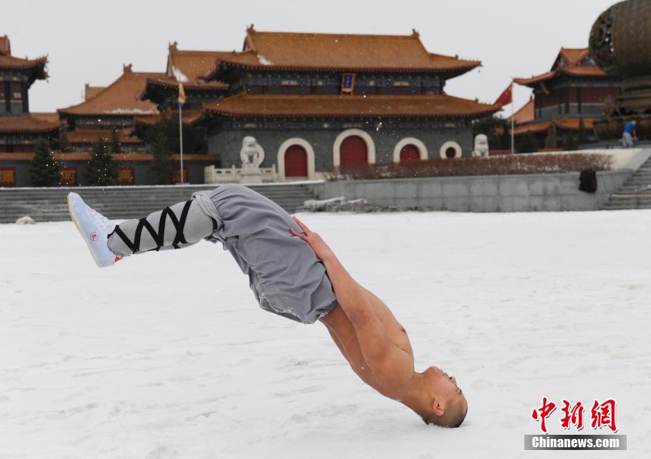 Monks practice Shaolin kung fu