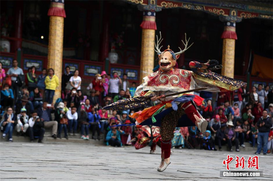 'Tiao Qian' ceremony held at ancient Taer Monastery