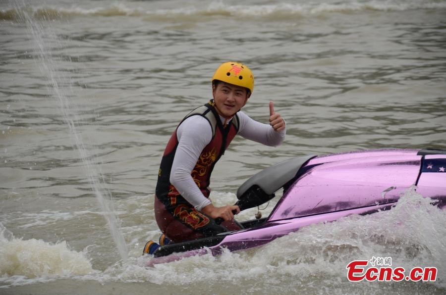 Waterskiing stunt performance at cultural festival