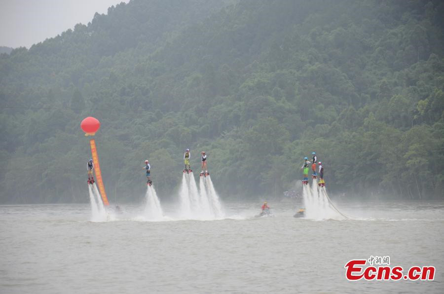 Waterskiing stunt performance at cultural festival