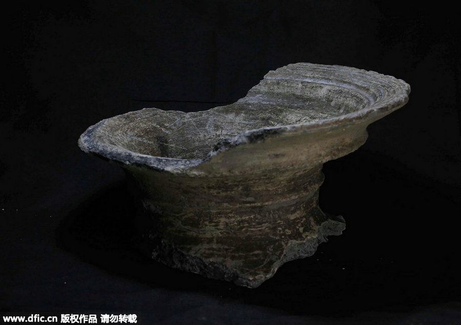 'Smiles from Ancient Times' exhibition held in Zhejiang