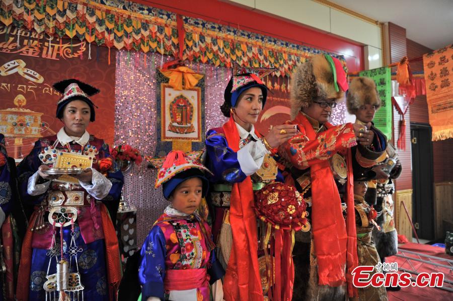 Young couple holds traditional Tibetan wedding ceremony